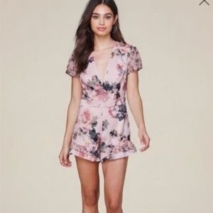 Bebe Floral Satin Romper with Ruffle Detail